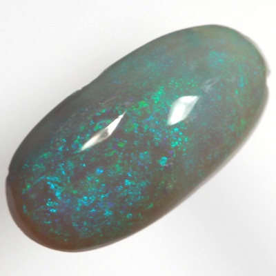 SOLID SEMI BLACK OPAL Sparkles of green over blue, high dome